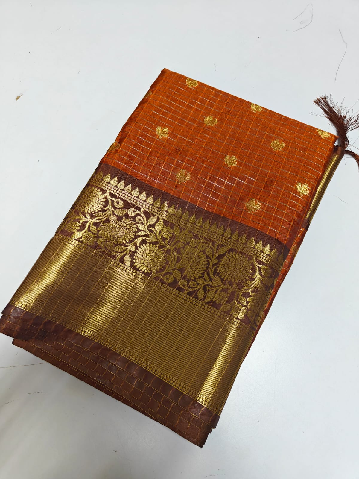 Orange and Brown Checked Tissue Silk Saree