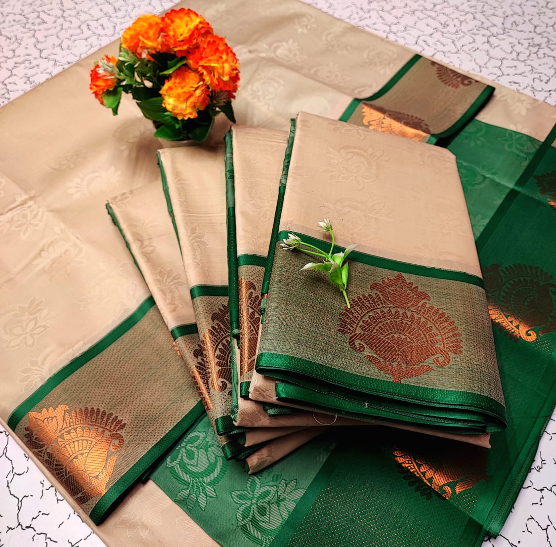 Half White and Green Embossed Soft Silk Saree