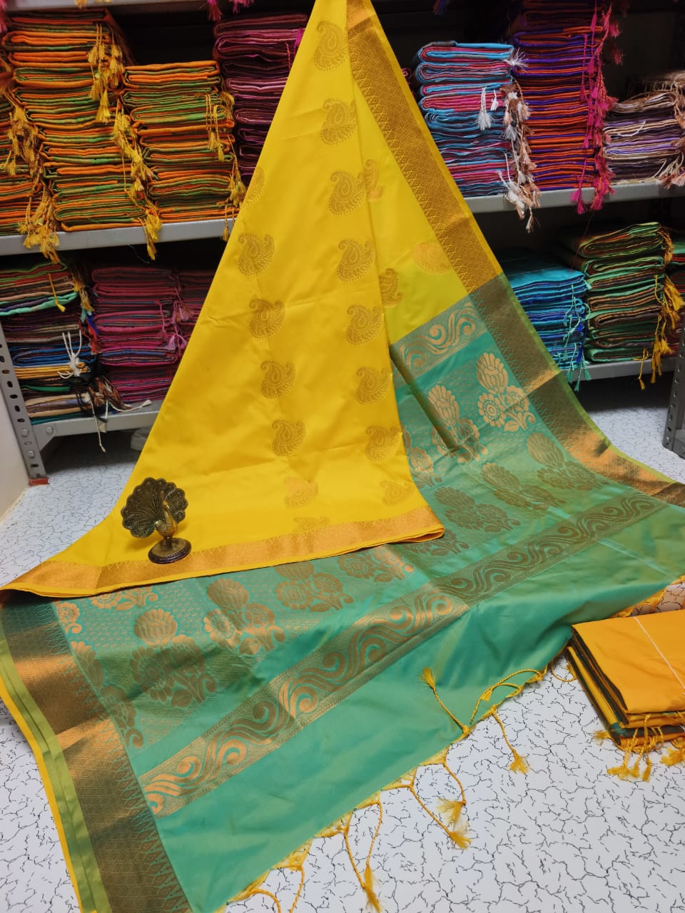 Yellow and Green Kanchivaram Jacquard Border Soft Silk Saree