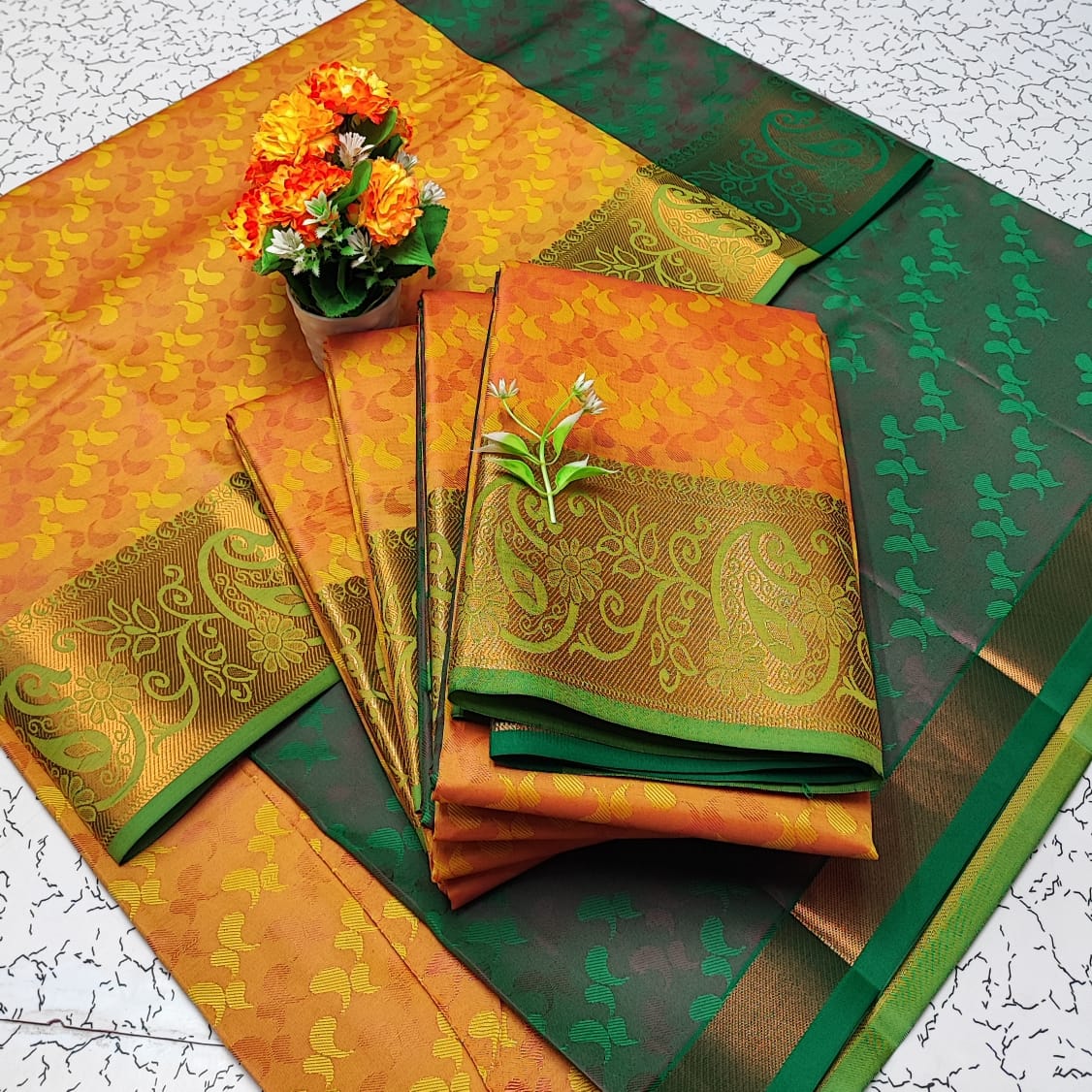 Yellow and Green Embossed Soft Silk Saree