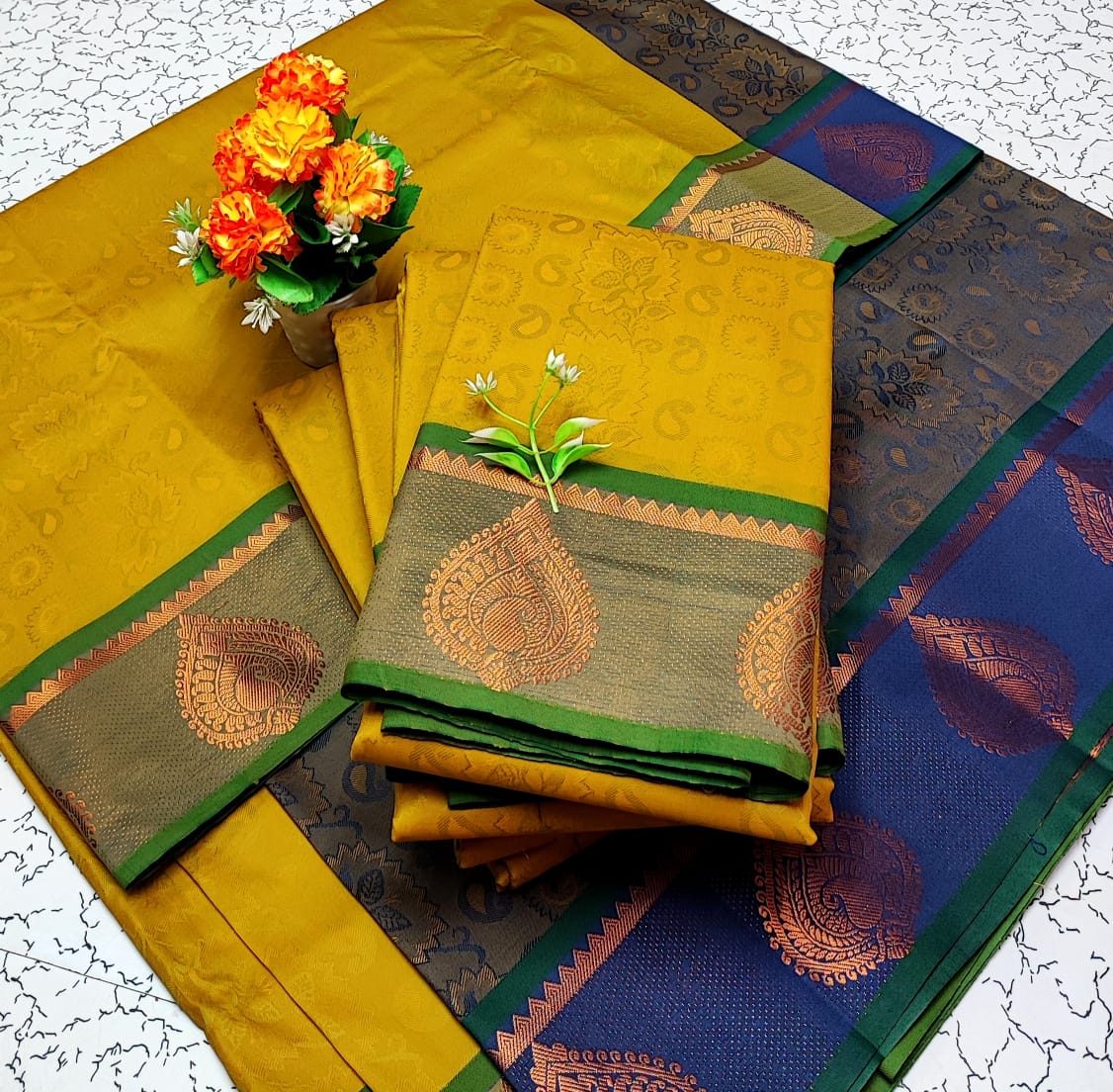 Mustard and Navy Blue Embossed Soft Silk Saree